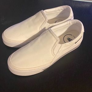 Nike canvas slip on shoes. NWOT. White size 6.5